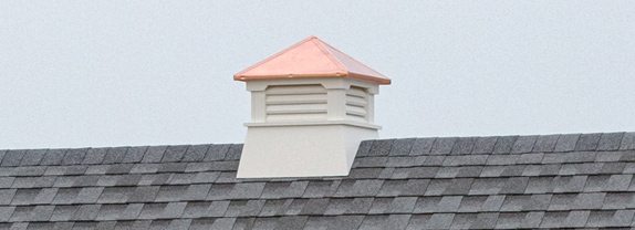 Square vinyl cupola with copper roof.