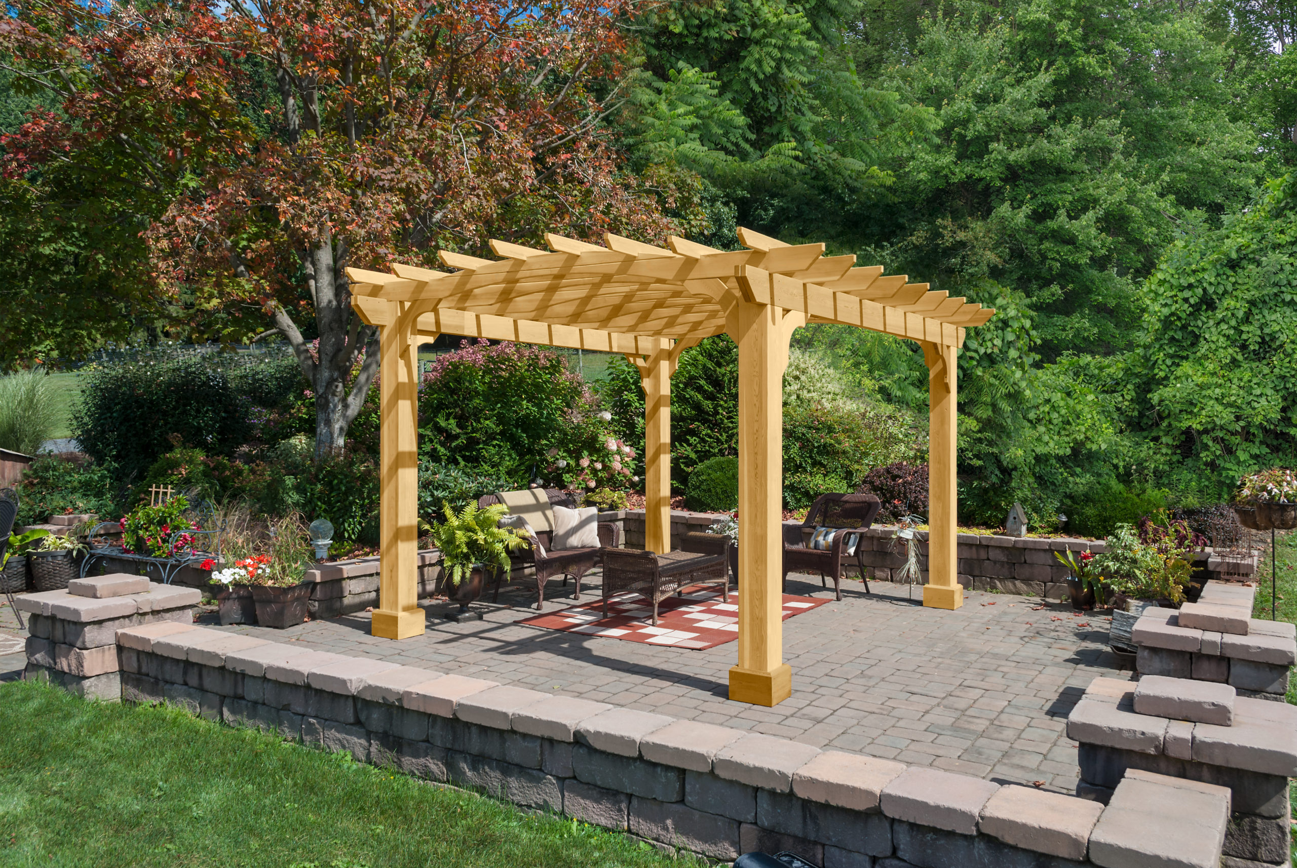 Traditional pergola shading a stone patio.