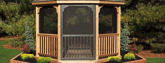 Optional screen package on a cedar stained, octagon shaped, gazebo.