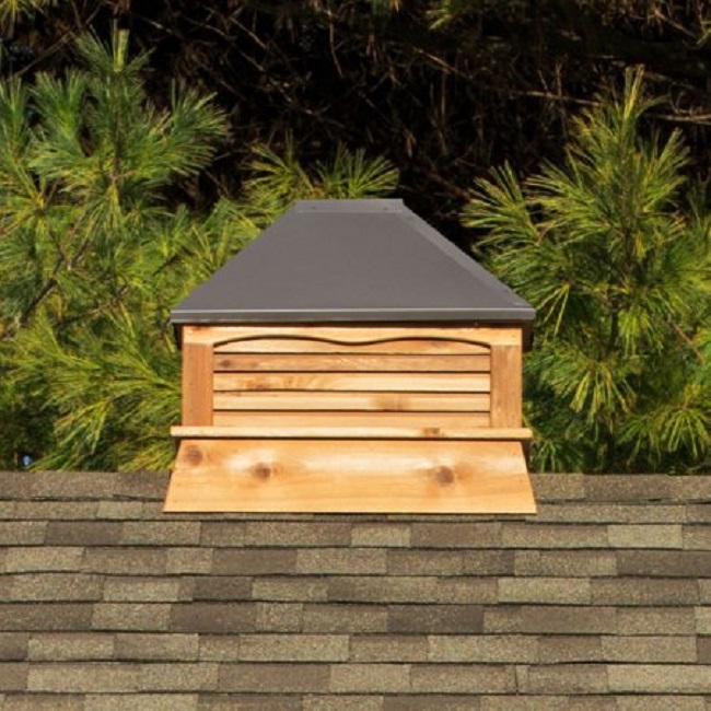 Rectangle cedar cupola with a bronze metal roof.