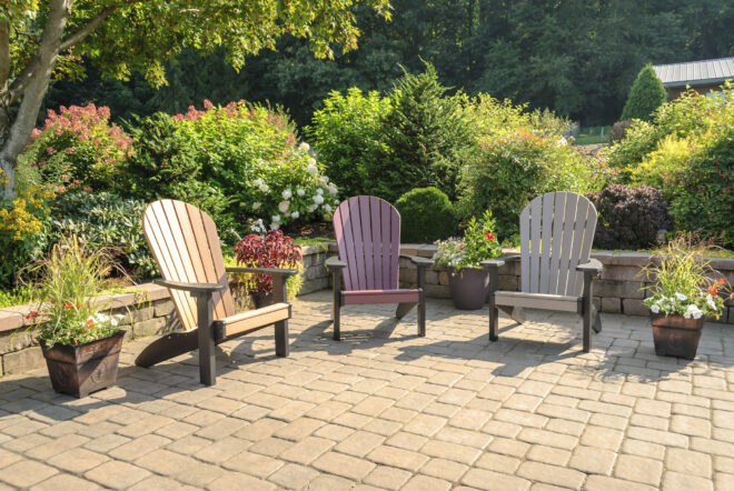 Stone patio and Adirondack chairs.