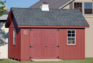 Red wood storage shed.