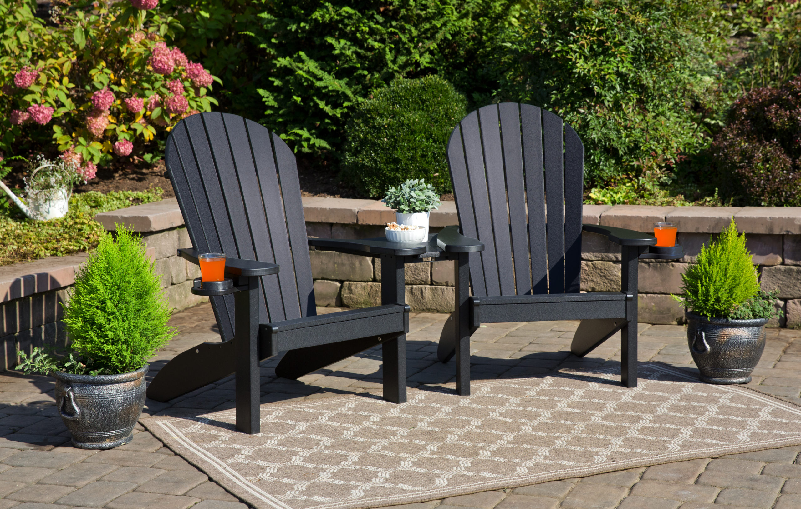 Black poly Adirondack chairs.