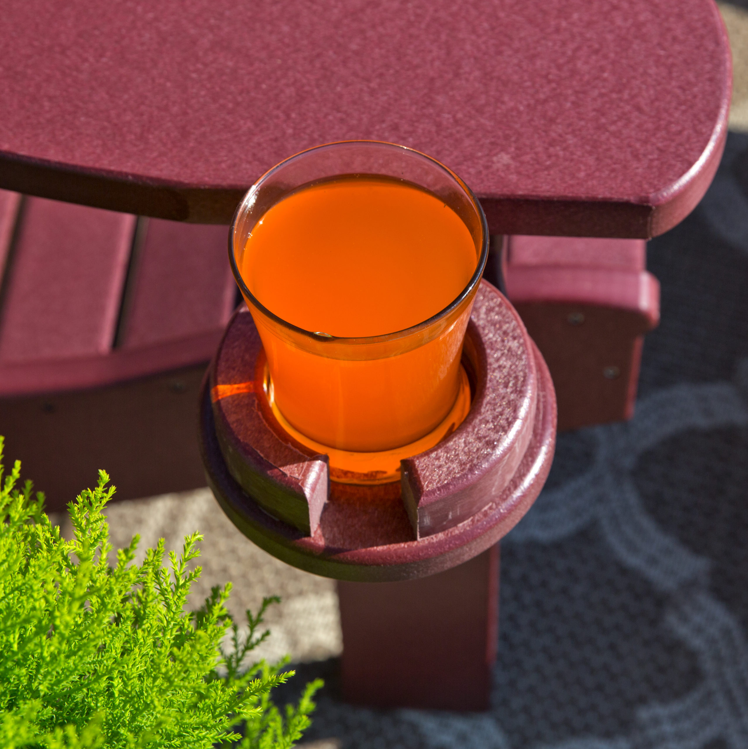 Cherry poly Adirondack chair cupholder.