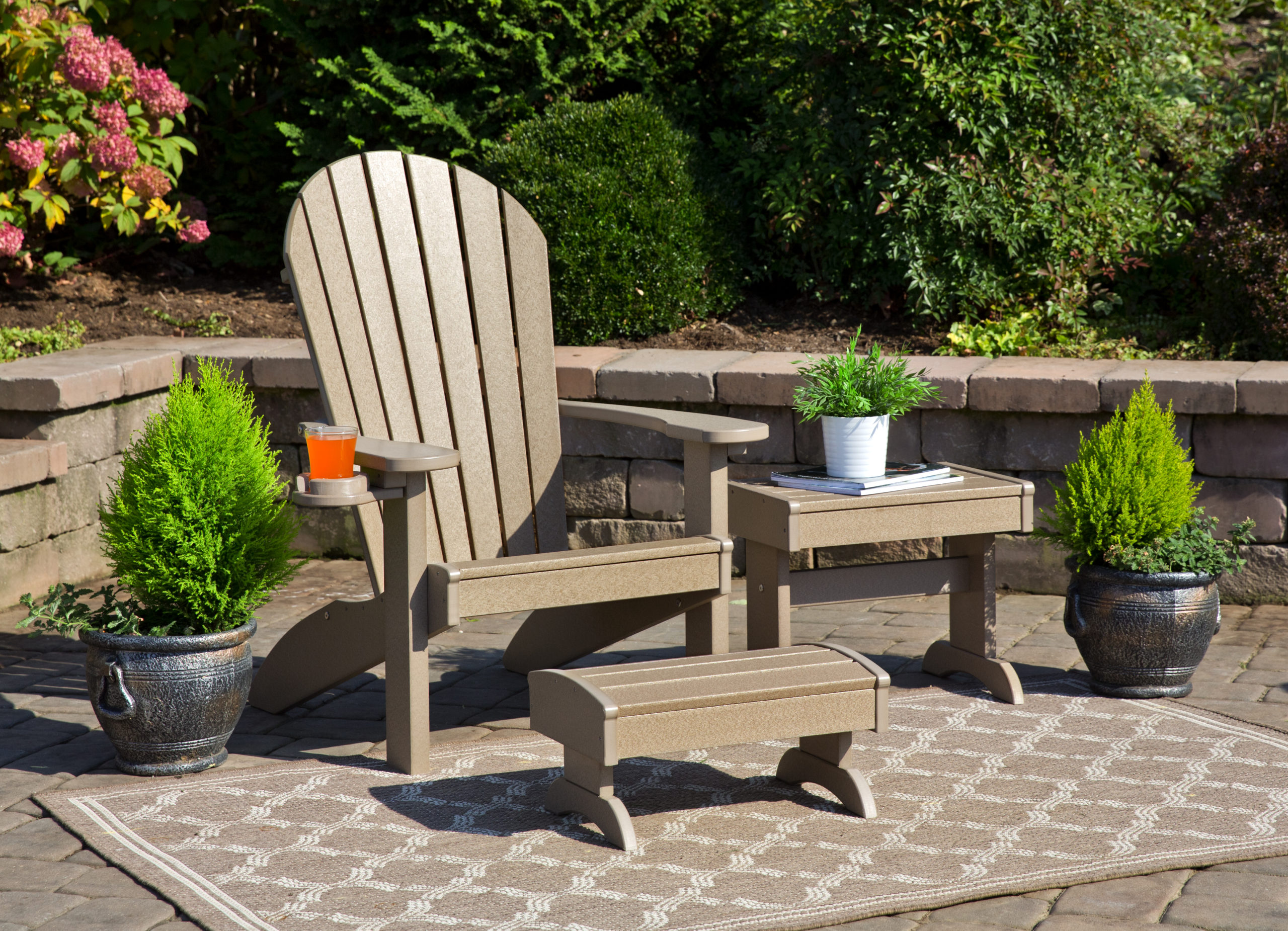 Weathered poly wood deluxe Adirondack chair set.