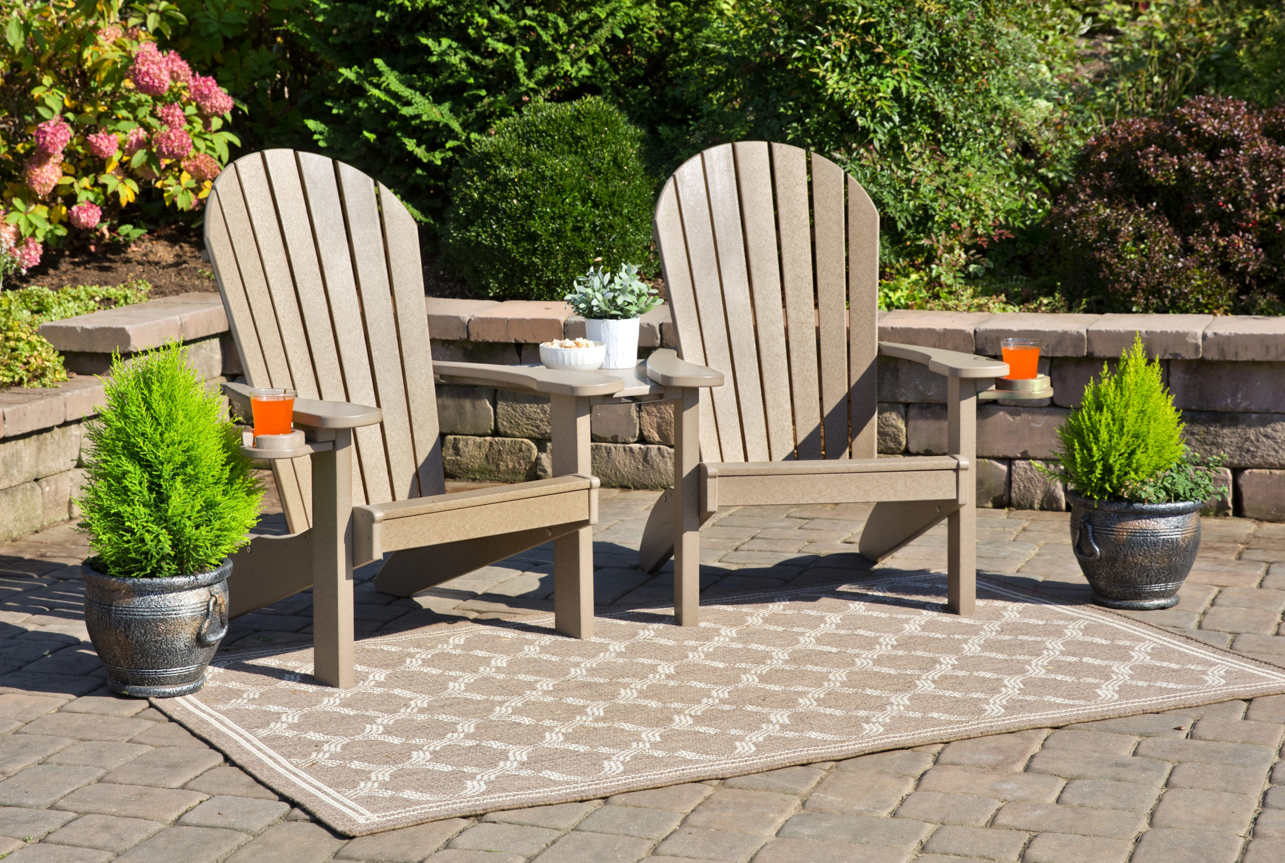 Weathered poly wood companion Adirondack chair set.