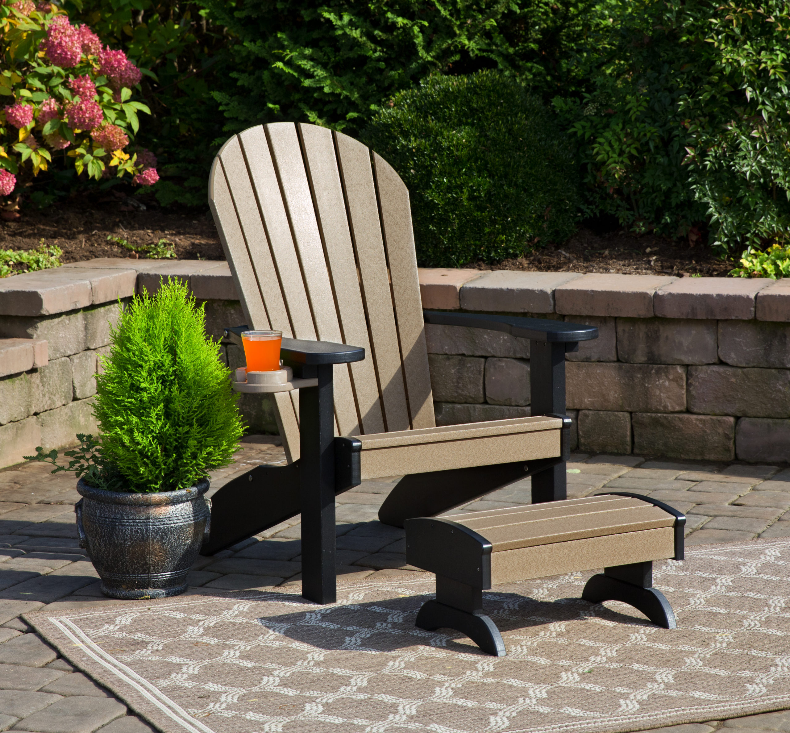 Weathered poly wood and black classic Adirondack chair set.