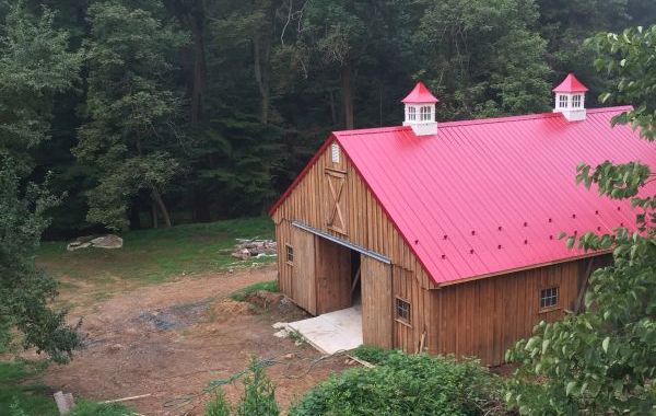 Cupolas installed on a large barn.