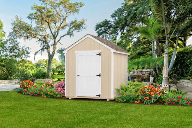 7 by 7 cream garden shed with white door and trim.