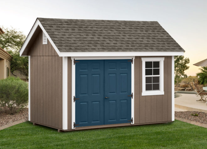8 by 12 Weathered garden shed with blue doors.
