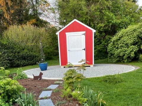 Red and white garden shed
